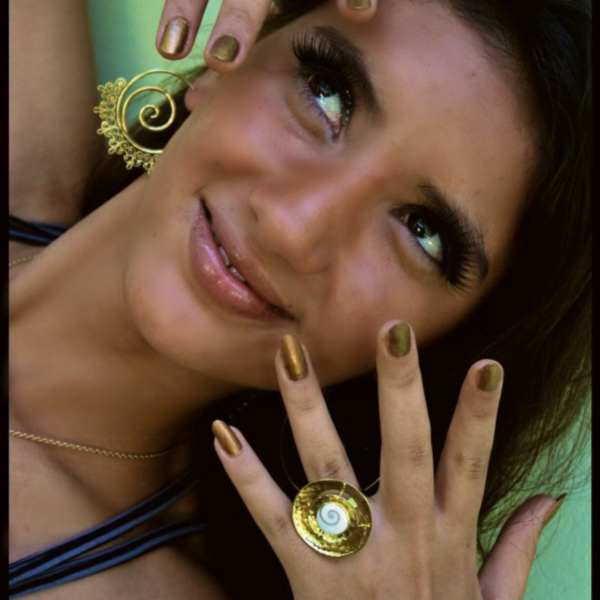 Handcrafted Shiva eye shell ring in a tribal brass spiral by CocoRoots