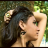 Handcrafted Shiva eye shell ring in a tribal brass spiral by CocoRoots