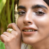 Smiling girl with fidget ring brass